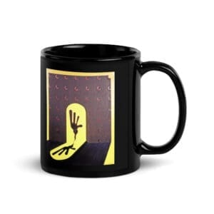 Black mug with yellow hand silhouette